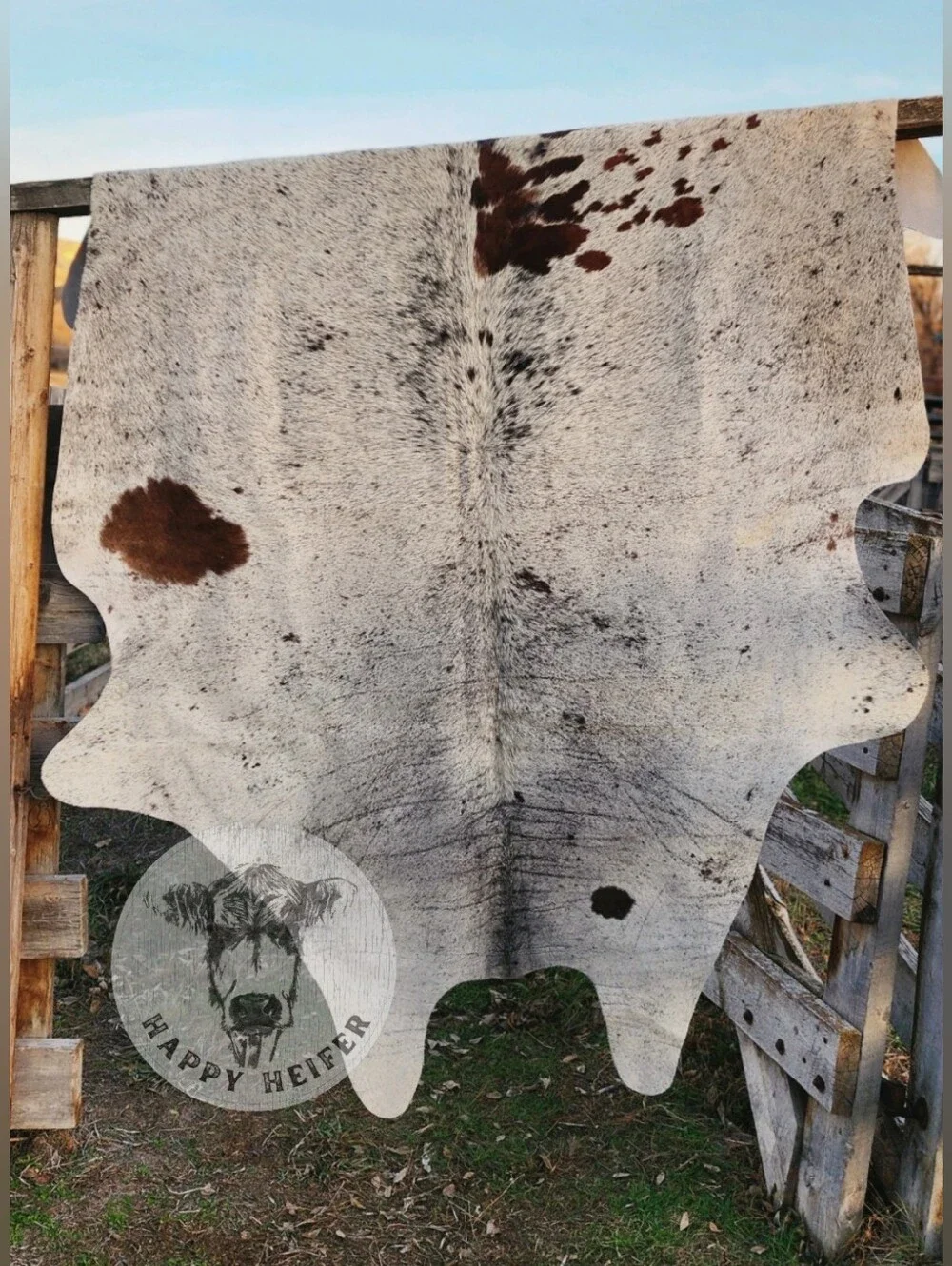 Stunning Brazilian Gray, Black and Brown Splatter Cowhide Rug.